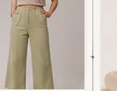 Model wearing green knitted wide-leg pants