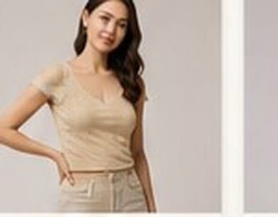 Model wearing a beige knitted top