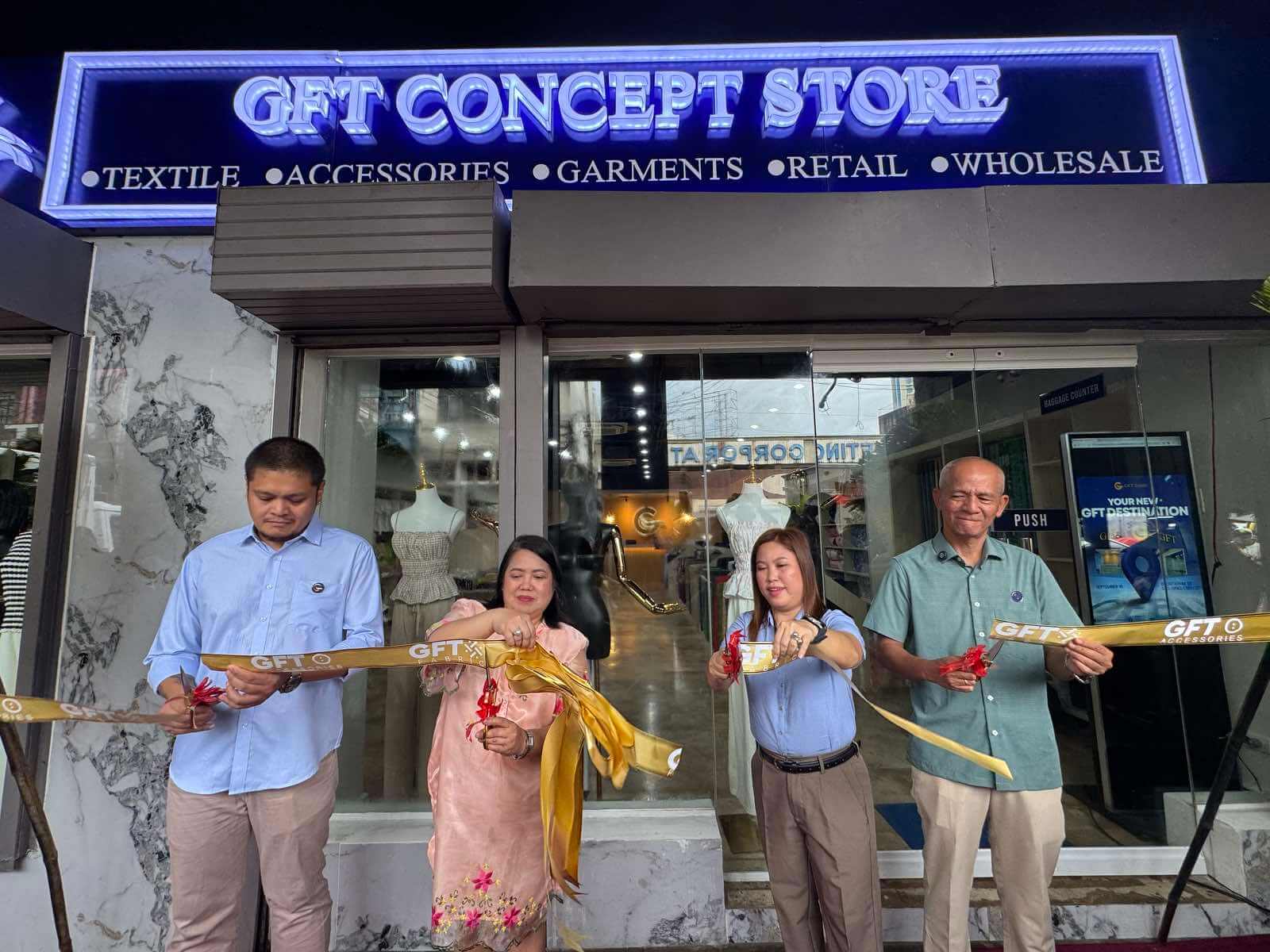 Ribbon-cutting at the GFT Concept Store storefront entrance